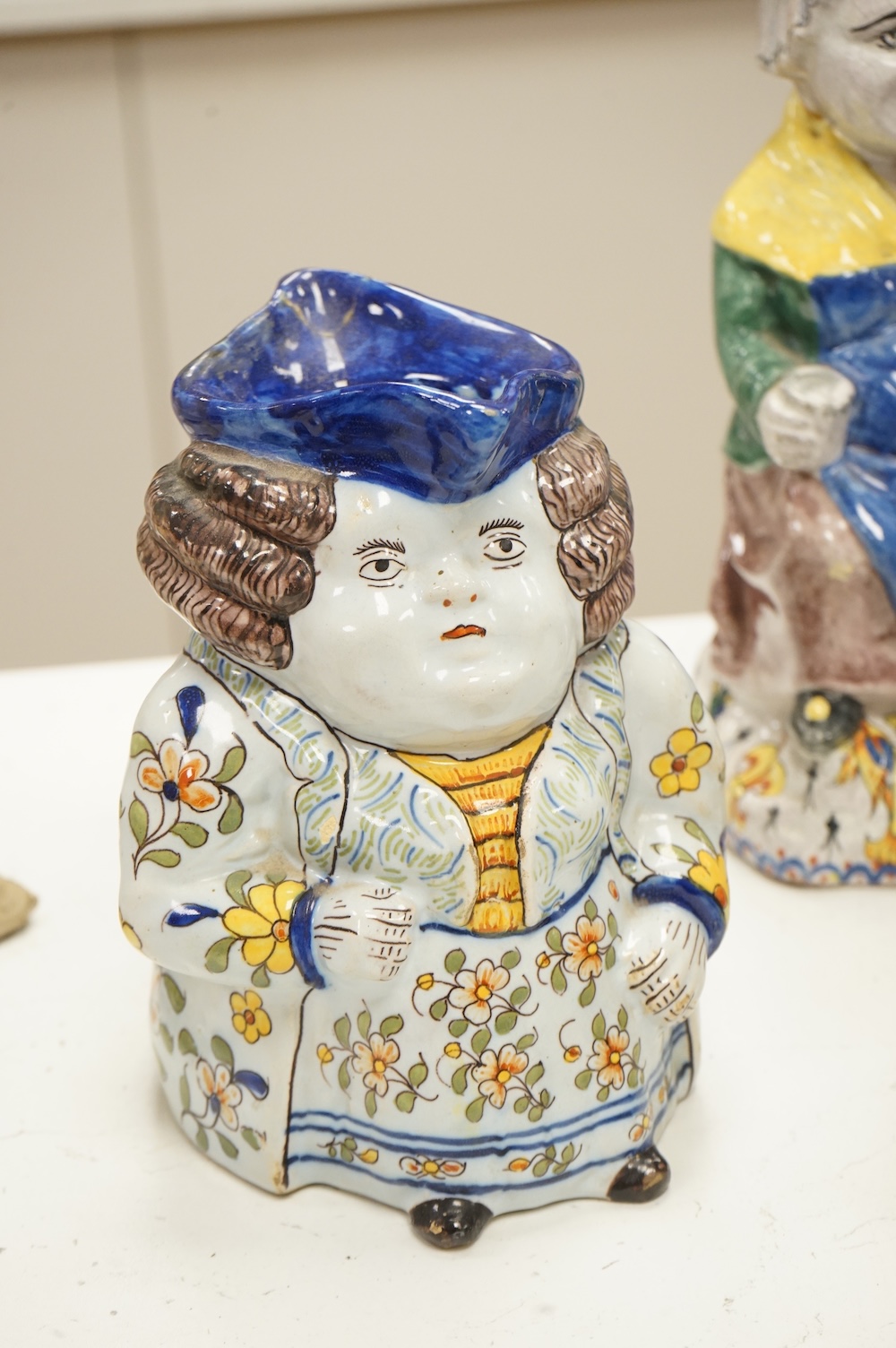 A group of five pieces of French tin glazed pottery, tallest 32cm